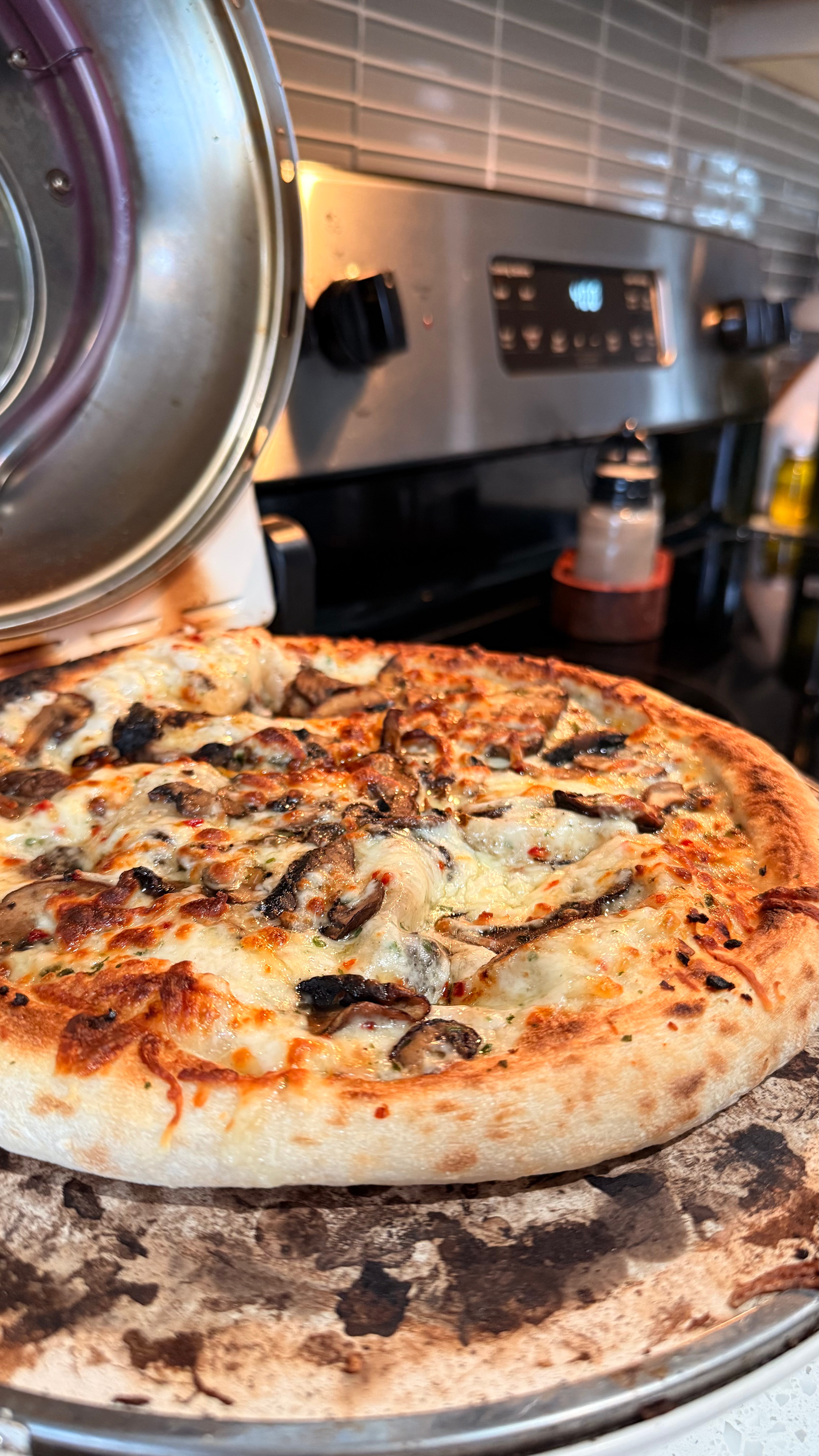 Trust me, you NEED a pizza stone in your kitchen…